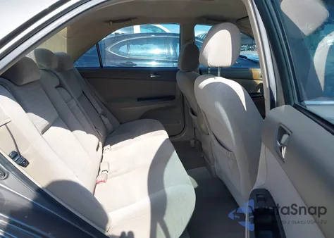 2006 Toyota Camry Le z USA, uszkodzony, nr VIN 4T1BE32KX6U698737